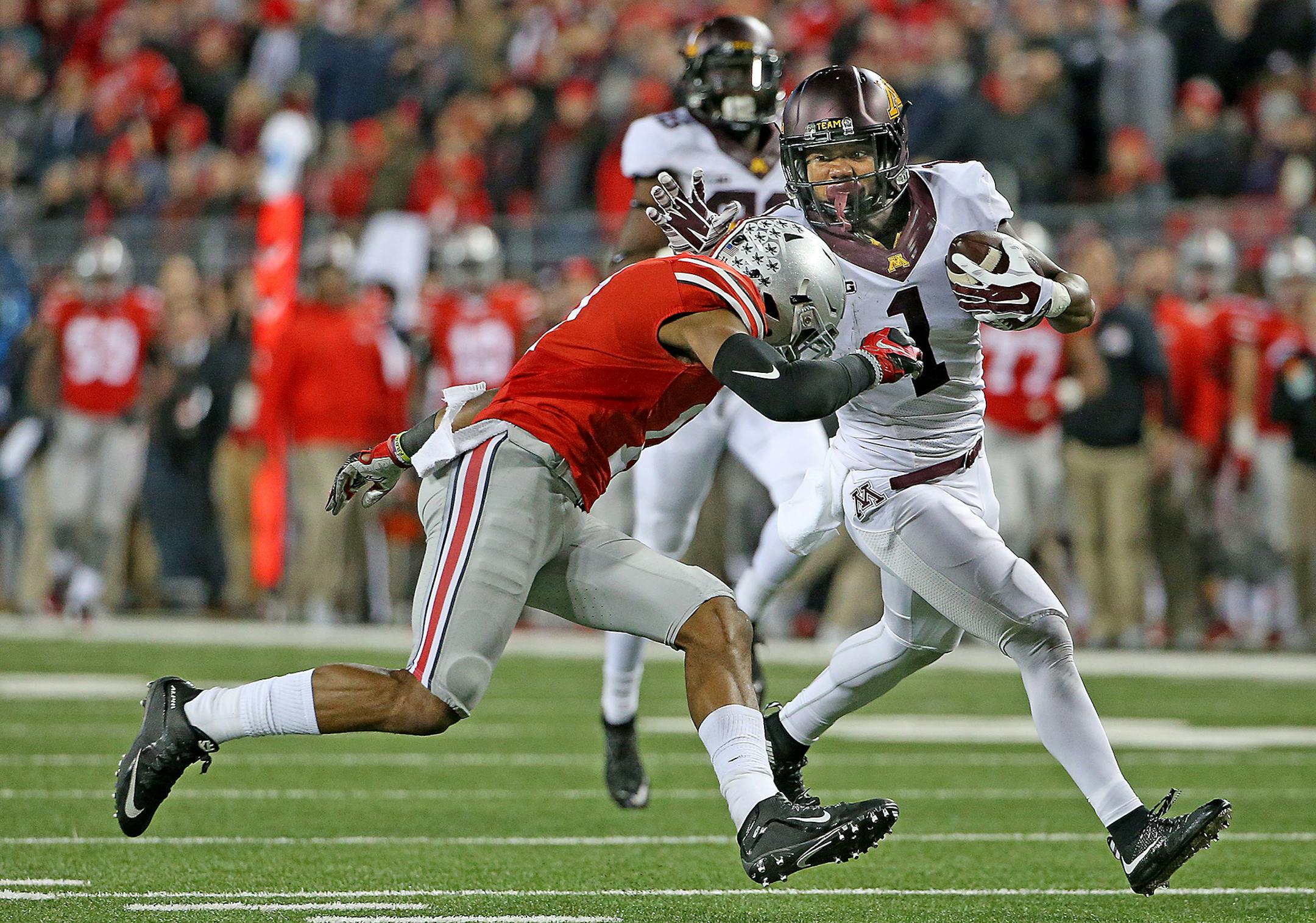 Minnesota's wide receiver KJ Maye carried the ball for more than 50 yards before he was stopped by Ohio State's safety Vonn Bell in the fourth quarter.