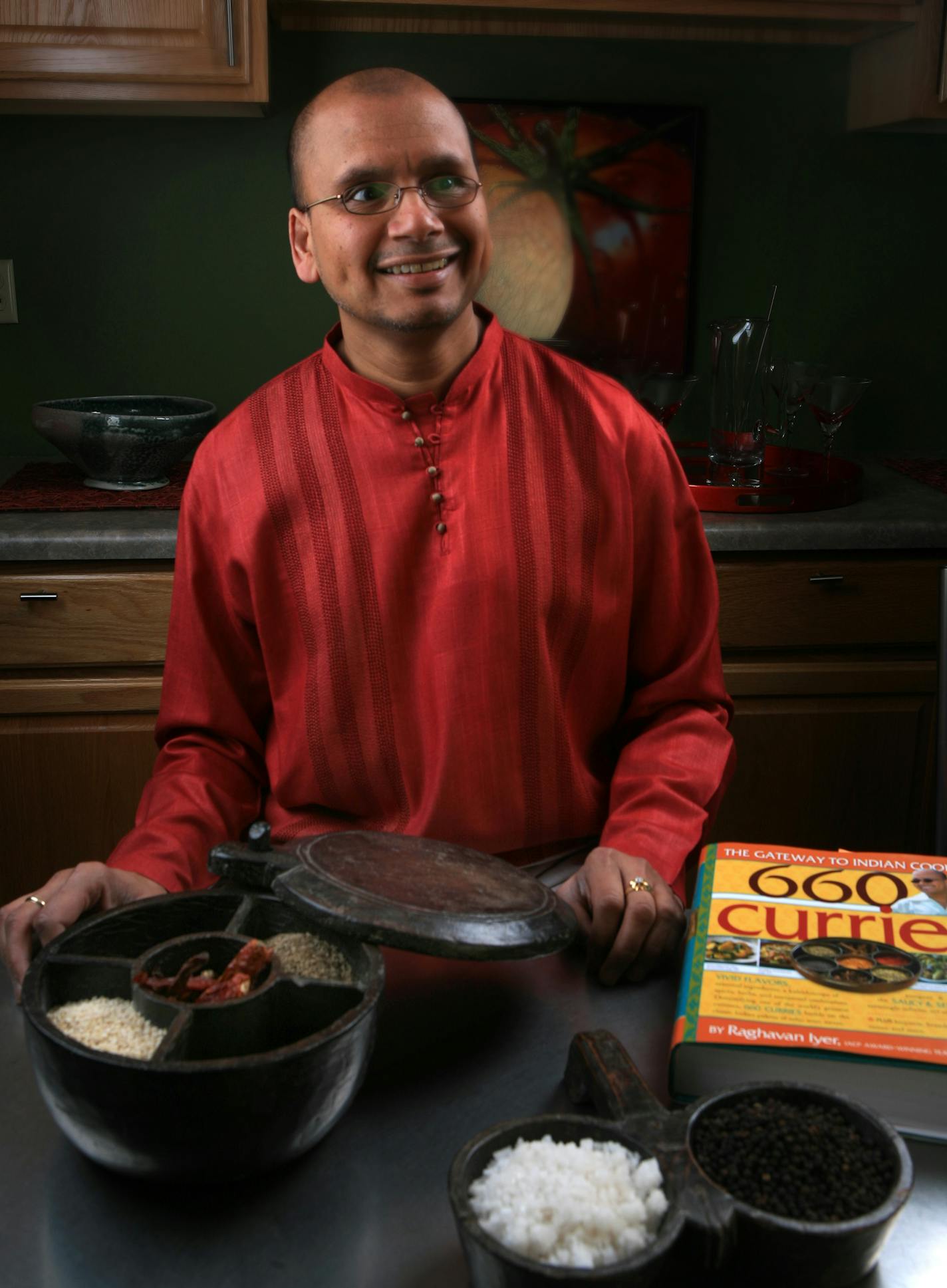 Raghavan Iyer, the author of "660 Curries" in his home.