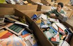 Marla Butler of Plymouth sorted books at Books for Africa in St. Paul. ] CARLOS GONZALEZ &#xef; cgonzalez@startribune.com - December 14, 2017, St. Pau