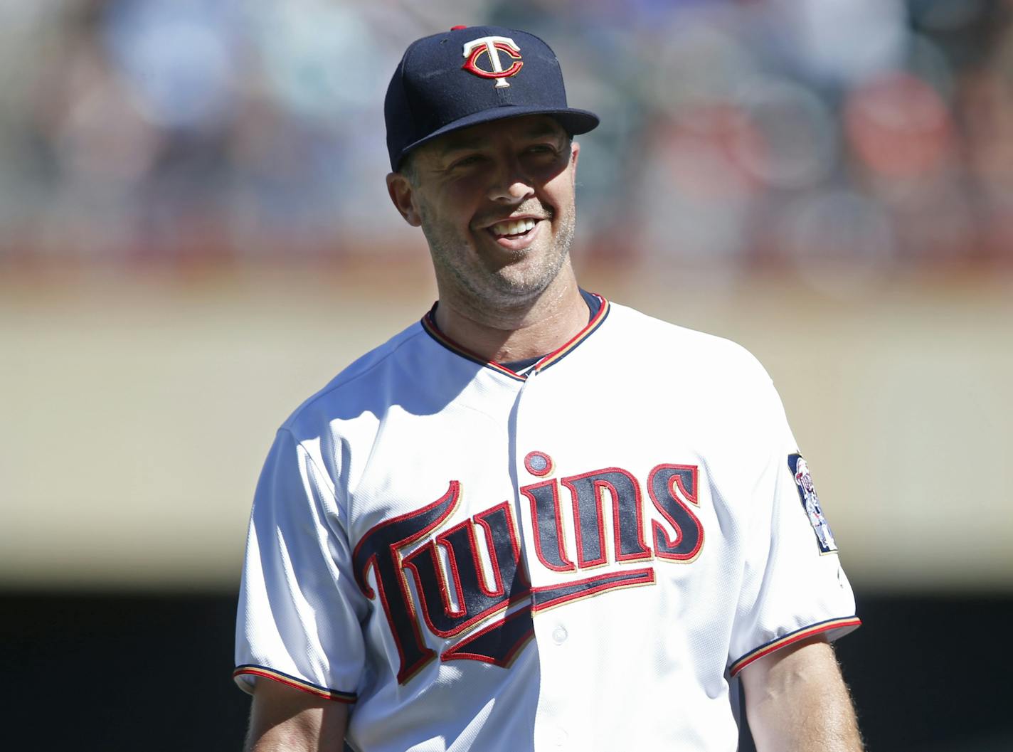 Minnesota Twins pitcher Brandon Kintzler celebrates the final out as the Twins beat the Texas Rangers 5-4 in a baseball game Sunday, July 3, 2016, in Minneapolis. (AP Photo/Jim Mone)