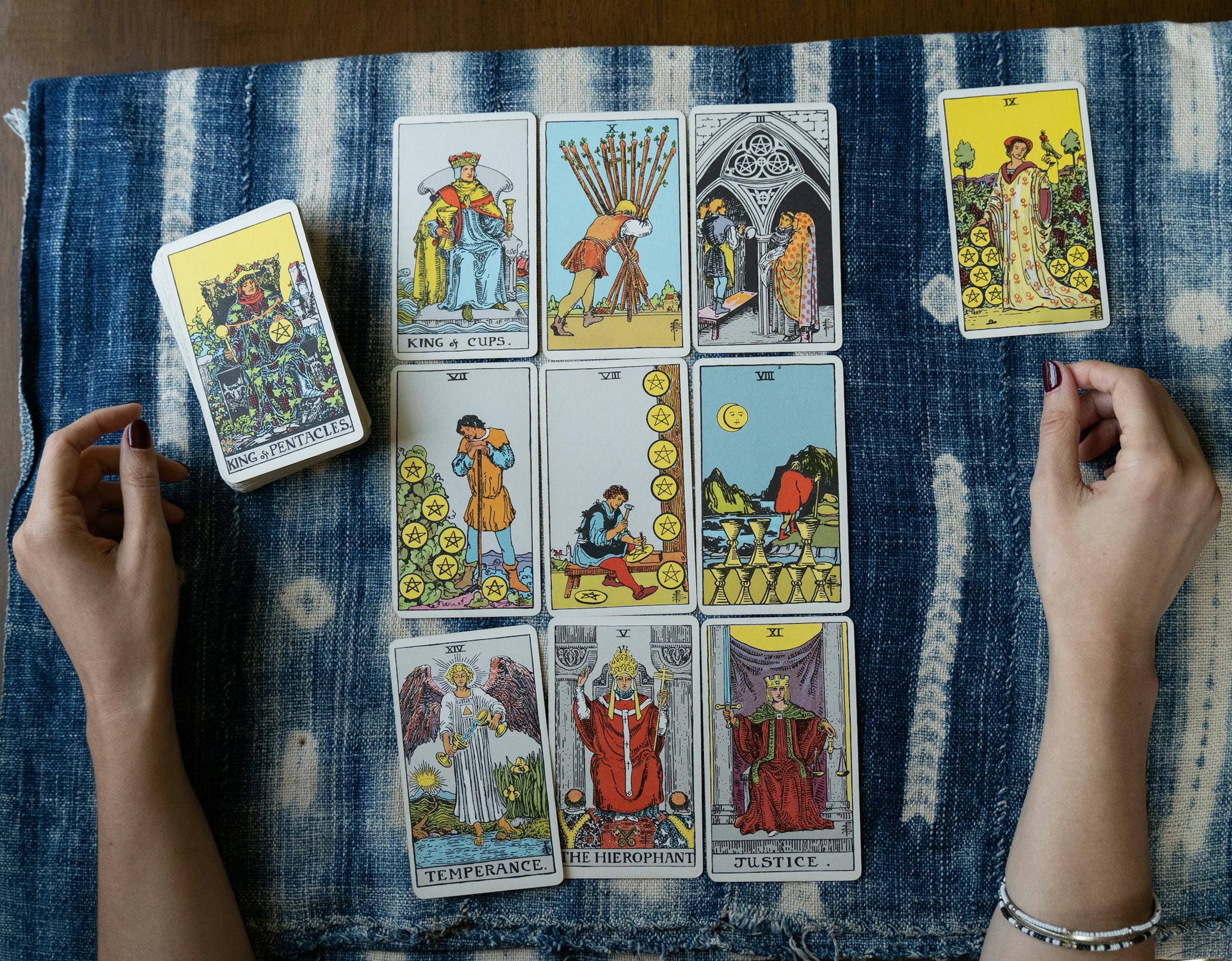 Jessica Dore's tarot cards placed in rows of three on her table on Aug. 6, 2019 in Germantown, Pa. (ANthony Pezzotti/The Phildelphia Inquirer/TNS)