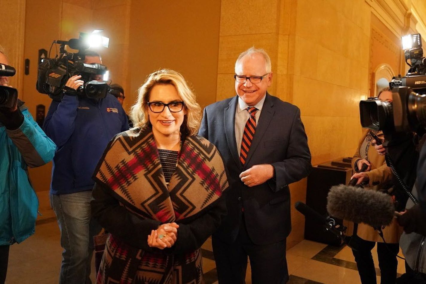 Lt. Gov.-elect Peggy Flanagan and Gov.-elect Tim Walz arrived at their transition offices in the State Capitol Thursday morning.