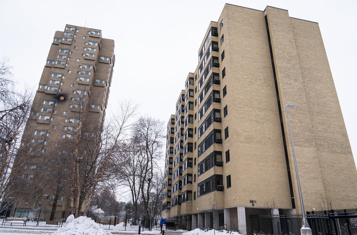 MPHA buildings in the Cedar-Riverside neighborhood of Minneapolis, including 1611 South 6th Street, right, and Cedar High Apartments, left. ] LEILA NAVIDI &#x2022; leila.navidi@startribune.com BACKGROUND INFORMATION: Tim Pilgrim, senior project manager at MPHA, showed some units being renovated at 1611 South 6th Street in Minneapolis on December 12, 2019.