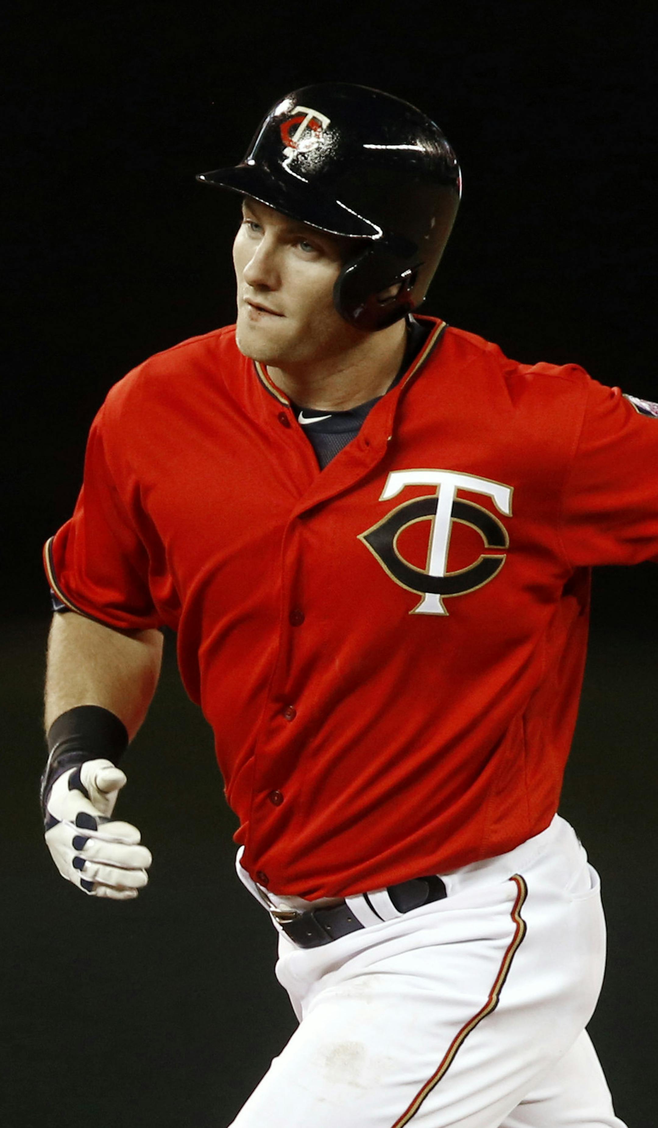 Minnesota Twins' Robbie Grossman rounds the bases on his solo home run off Toronto Blue Jays relief pitcher Chad Girodo during the ninth inning of a baseball game Friday, May 20, 2016, in Minneapolis. The Blue Jays won 9-3. (AP Photo/Jim Mone)
