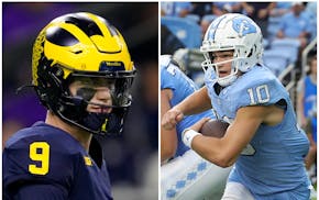 In search of a quarterback in the upcoming draft, the Vikings have their eyes on J.J. McCarthy of Michigan, left, and Drake Maye of North Carolina.