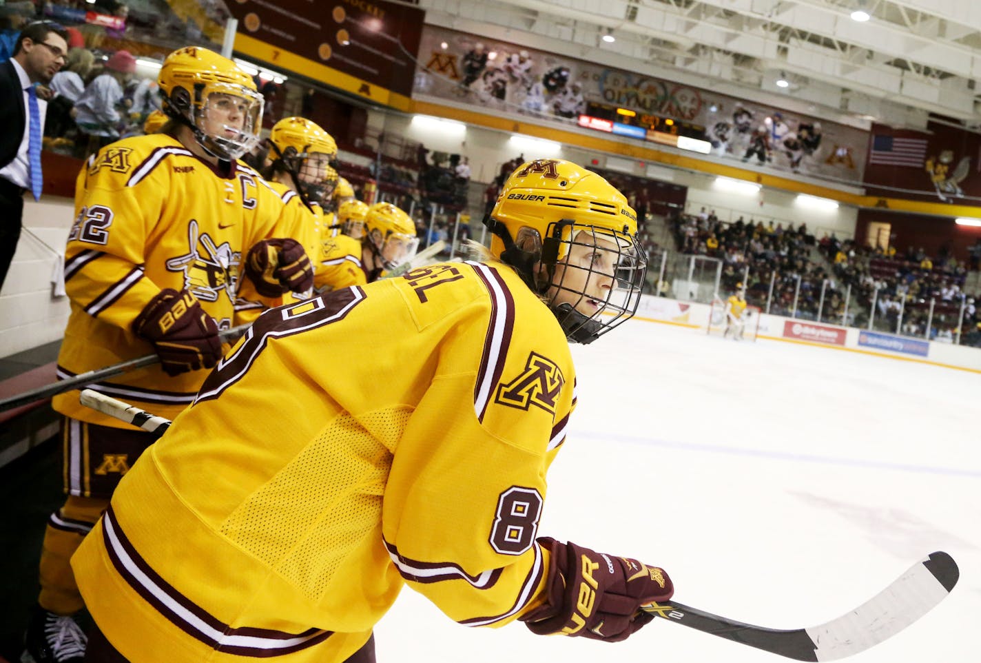 In her first game back, Amanda Kessel takes to the ice with her University of Minnesota teammates during action with North Dakota