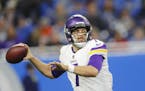 Minnesota Vikings quarterback Case Keenum throws during the first half of an NFL football game against the Detroit Lions, Thursday, Nov. 23, 2017, in 