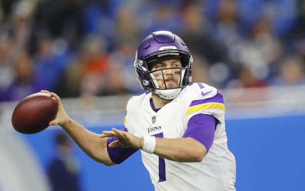 Minnesota Vikings quarterback Case Keenum throws during the first half of an NFL football game against the Detroit Lions, Thursday, Nov. 23, 2017, in 