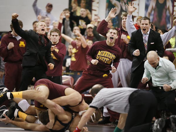 Dylan Ness, at 157 pounds, pinned Penn State's Dylan Alton to give the Gophers the jolt they needed before a full house at the Sports Pavilion.