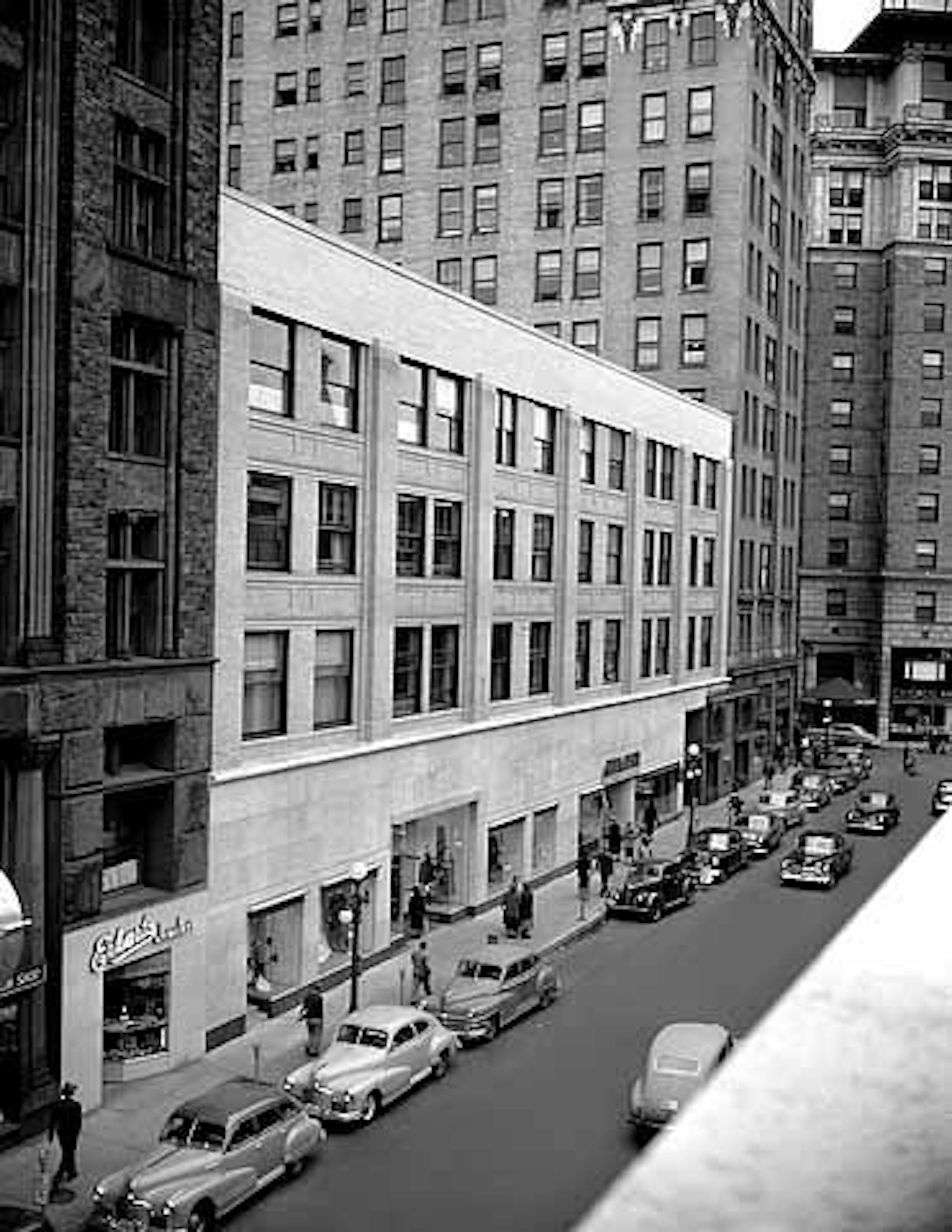 Newly remodeled front of the old Grand Arcade building on Fifth Street, 1949. Portions of the original 1893 facade still exist behind the modern-era stonework.