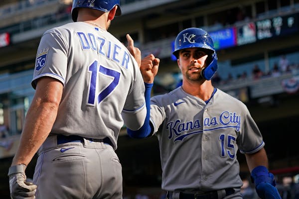 Royals score in eighth and ninth innings to edge Twins, win series