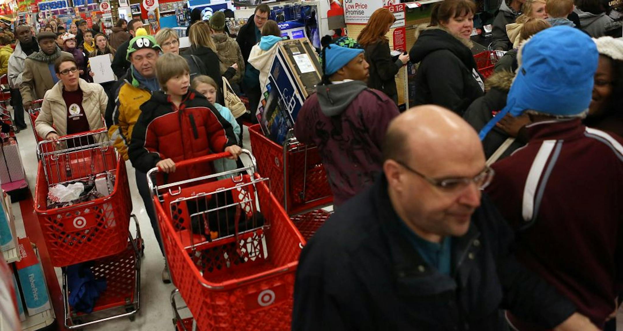 Shoppers eager to find bargains, rushed through the crowded aisles of the Target store.
