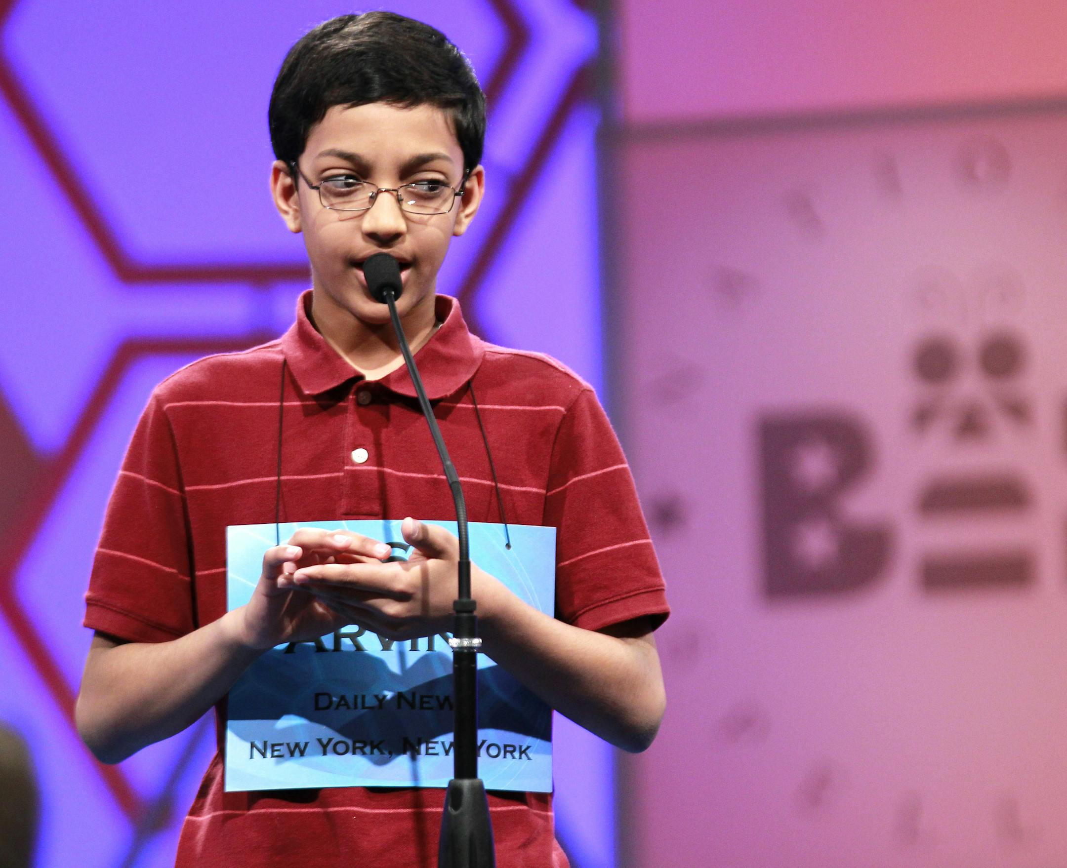 Arvind Mahankali, 12, of Bayside Hills, N.Y., spells a word during the finals of the National Spelling Bee Thursday, May 31, 2012 in Oxon Hill, Md. (AP Photo/Alex Brandon)