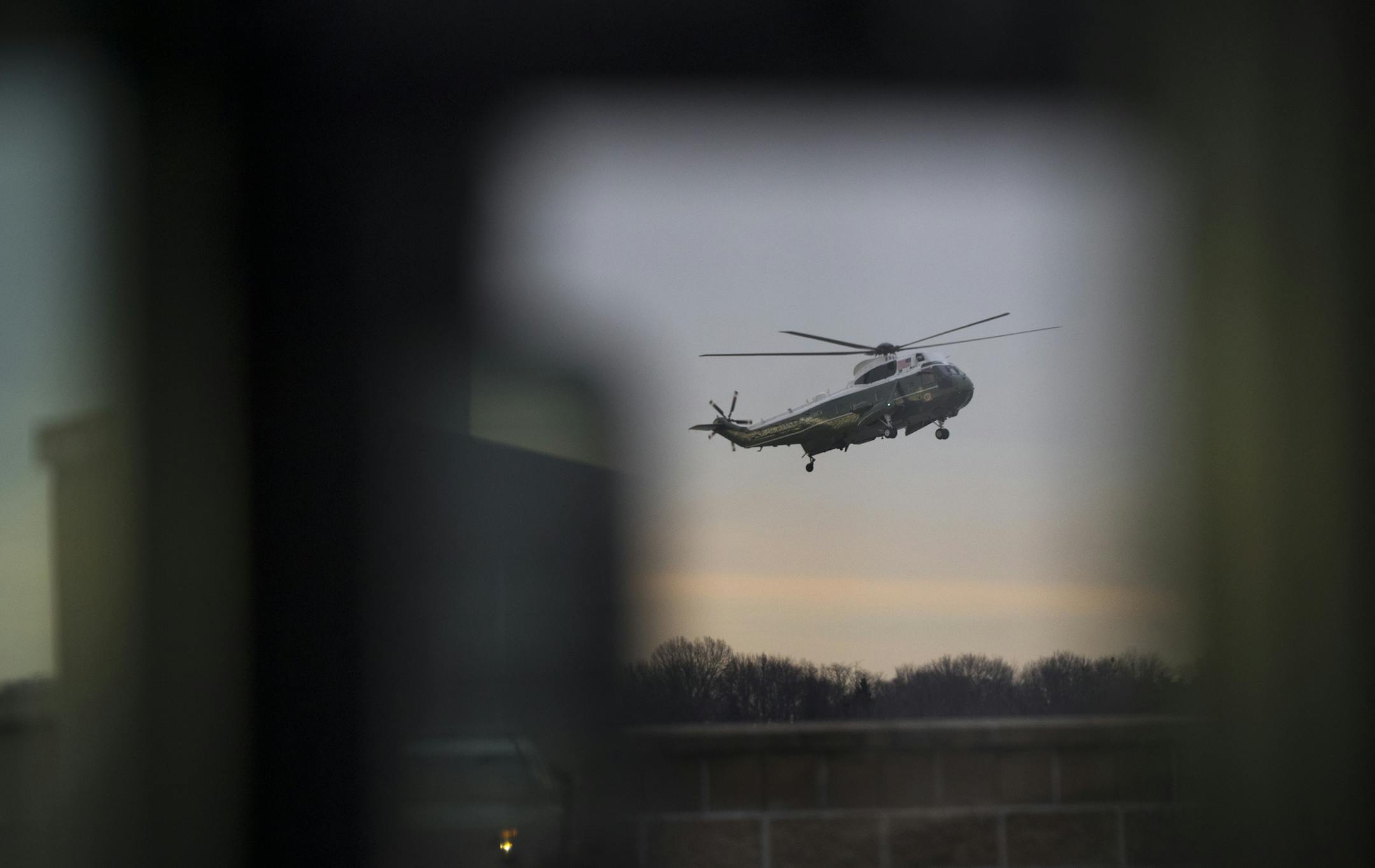 President Donald Trump arrives aboard Marine Force One to meet with the family of a Navy SEAL killed during a raid in Yemen, at Dover Air Force Base in Delaware, Feb. 1, 2017. The raid on al-Qaida militants was the first such operation ordered by Trump since he took office on Jan. 20. (Stephen Crowley/The New York Times)