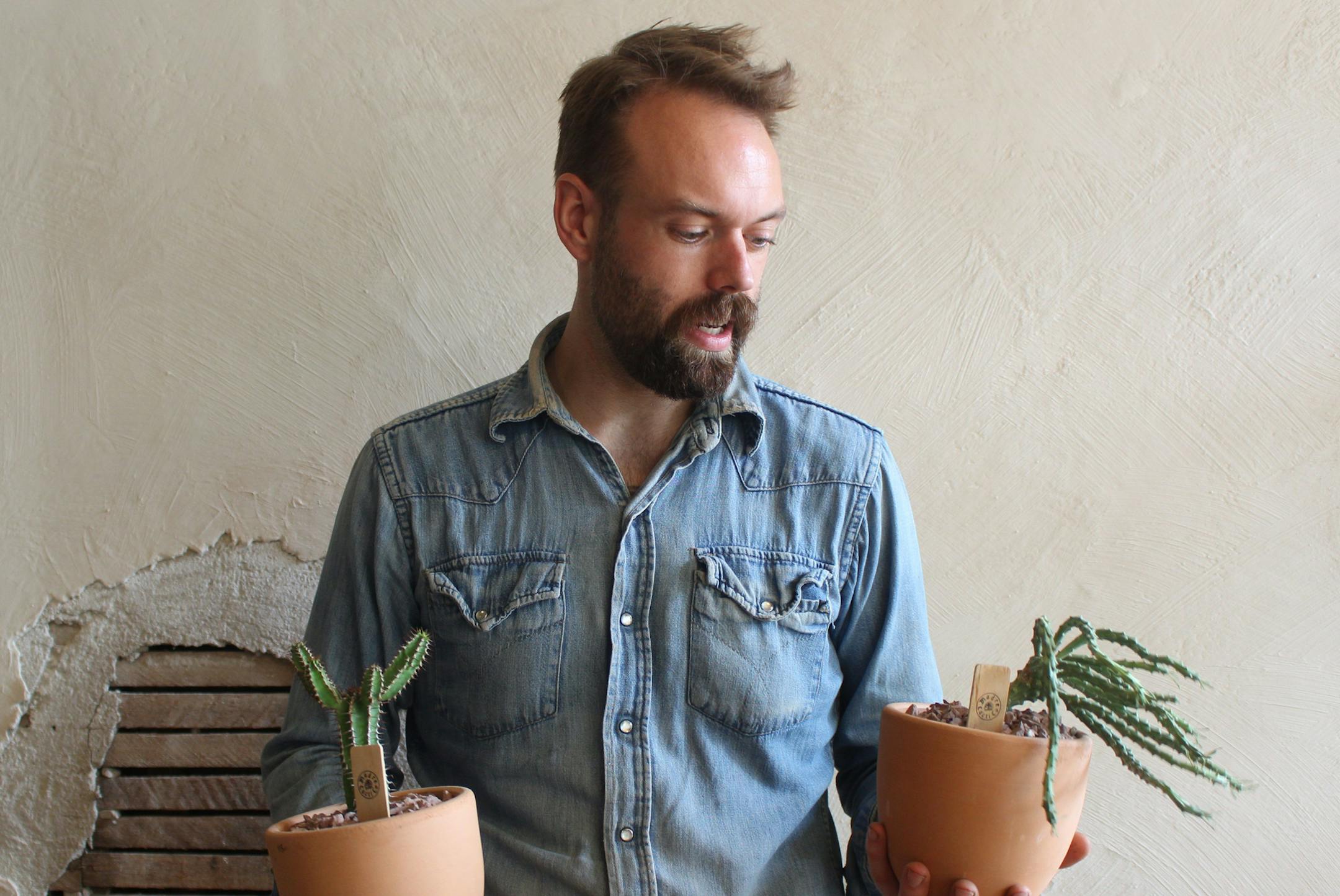 Owner Erik Hamline with some of the selection at Madre Cacti in northeast Minneapolis.