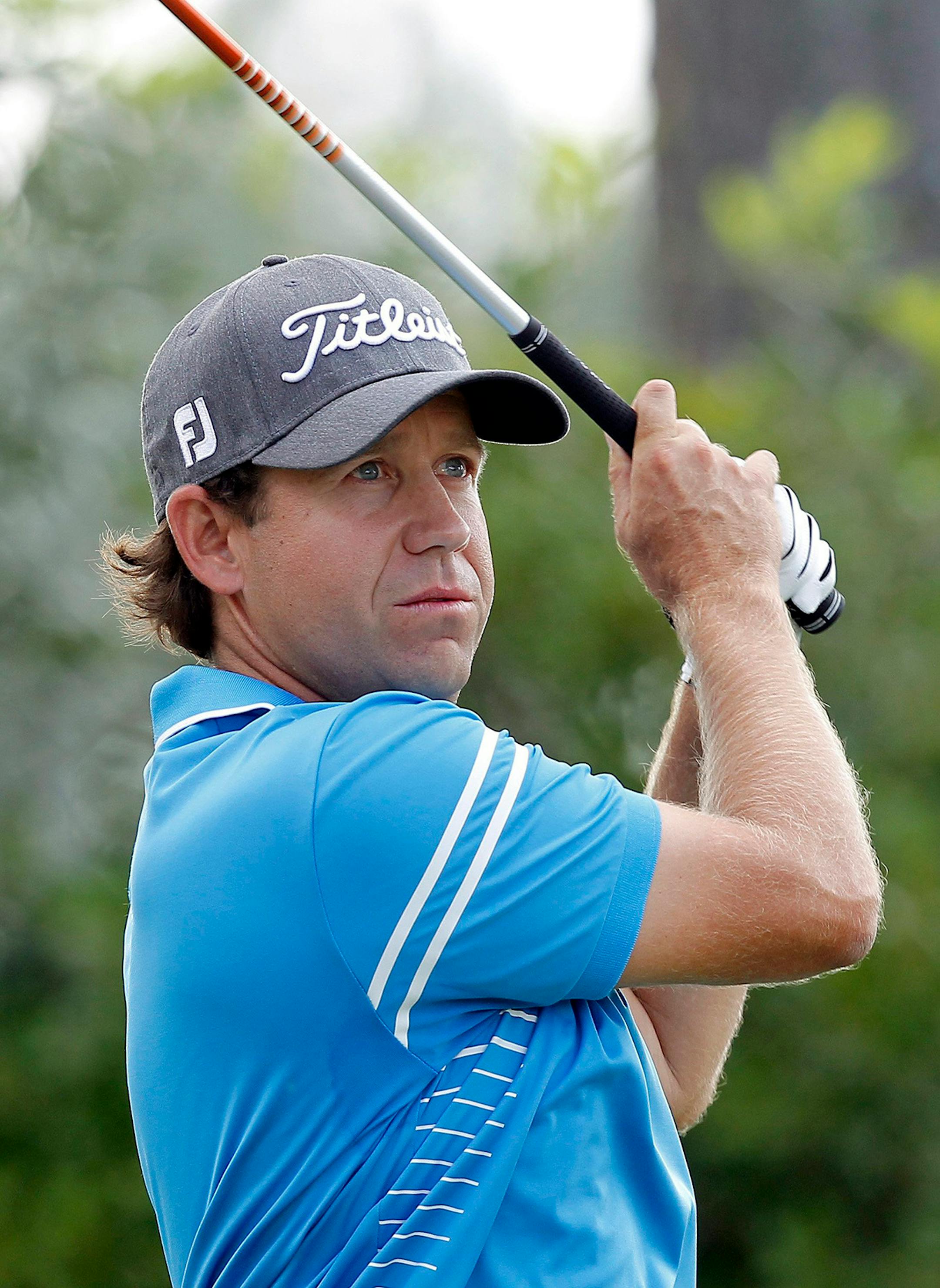 Erik Compton hits his tee shot on the 12th hole during the third round of the 2014 U.S. Open at Pinehurst No. 2 in Pinehurst, N.C., Saturday, June 14, 2014.