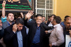 Masoud Pezeshkian, the reformist presidential candidate, after casting his vote in Iran's presidential runoff election at a mosque in Tehran, July 5, 