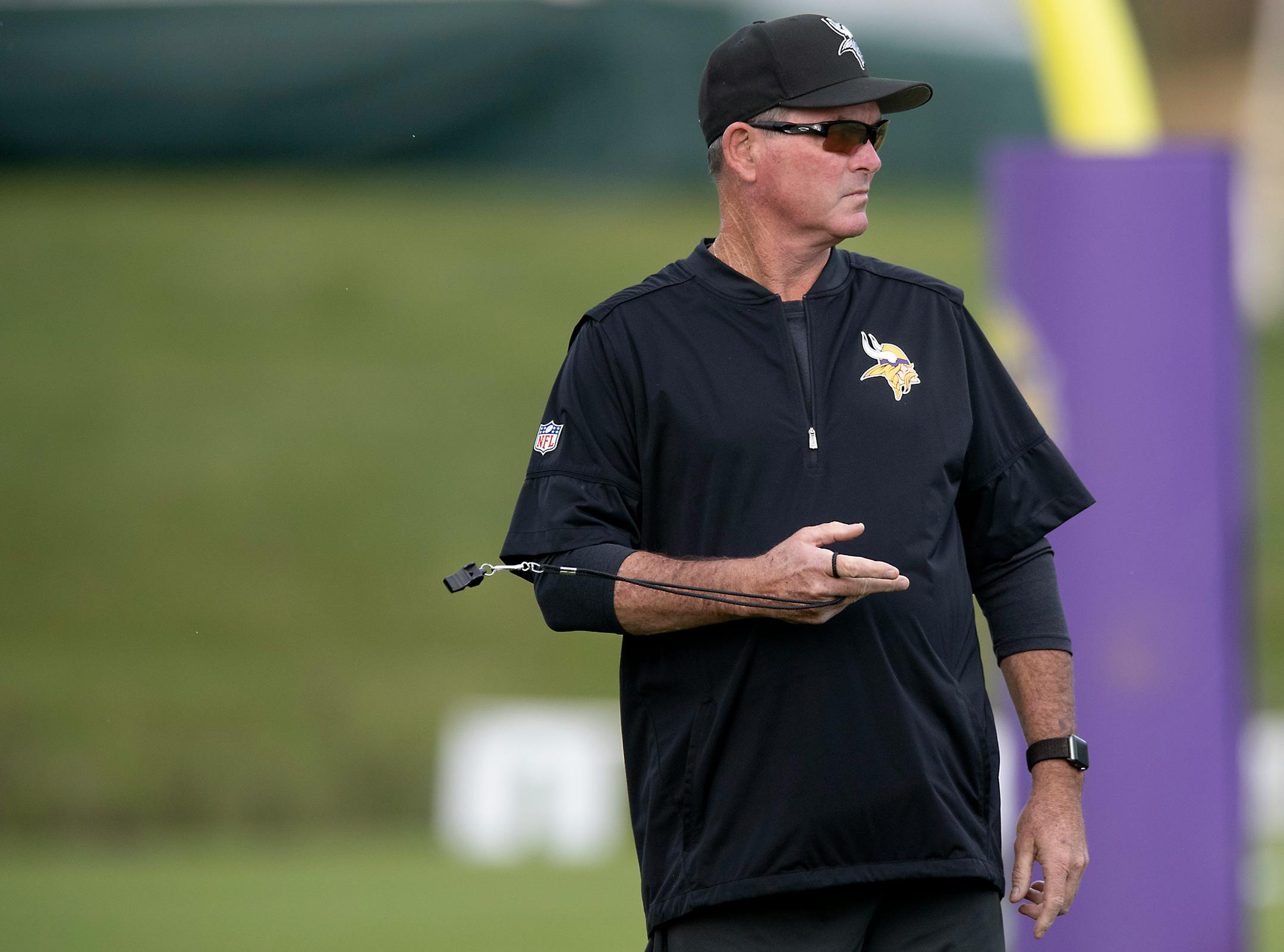 Vikings coach Mike Zimmer made his way onto the field for a walk-thru during the first full day of practice on Friday.