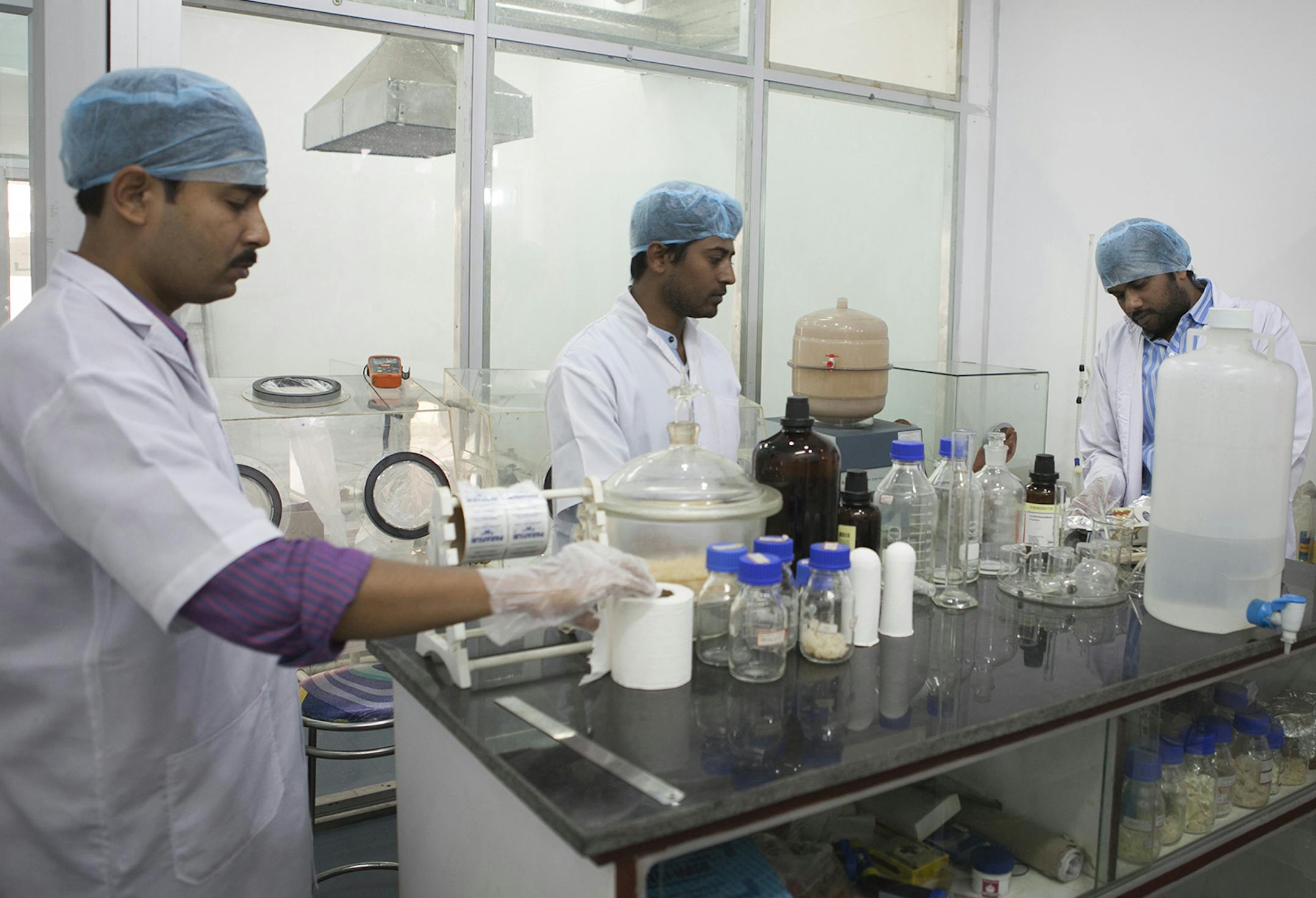 Research assistants work at the reversible inhibition of sperm under guidance (RISUG) male contraceptive treatment research and development laboratory at the Indian Institute of Technology Kharagpur in Kharagpur, West Bengal, India, on Feb. 16, 2017. (MUST CREDIT: Sumit Dayal/Bloomberg) ORG XMIT: 700027519