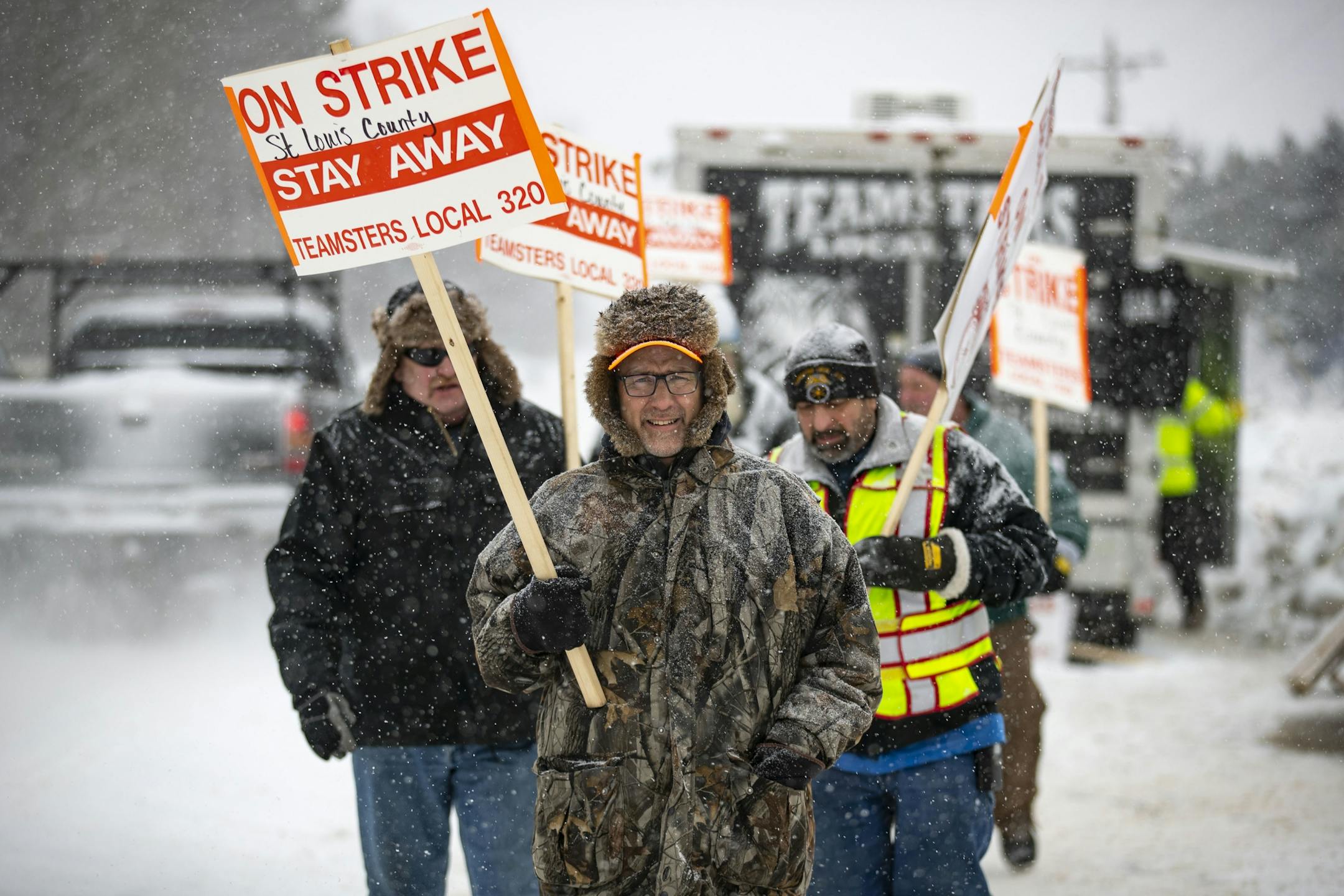 Brian Iverson walked with snow plow drivers who were picketing in front of the St. Louis County Public Works Department building in Northern Duluth, MN as snow fell on January 15, 2020.