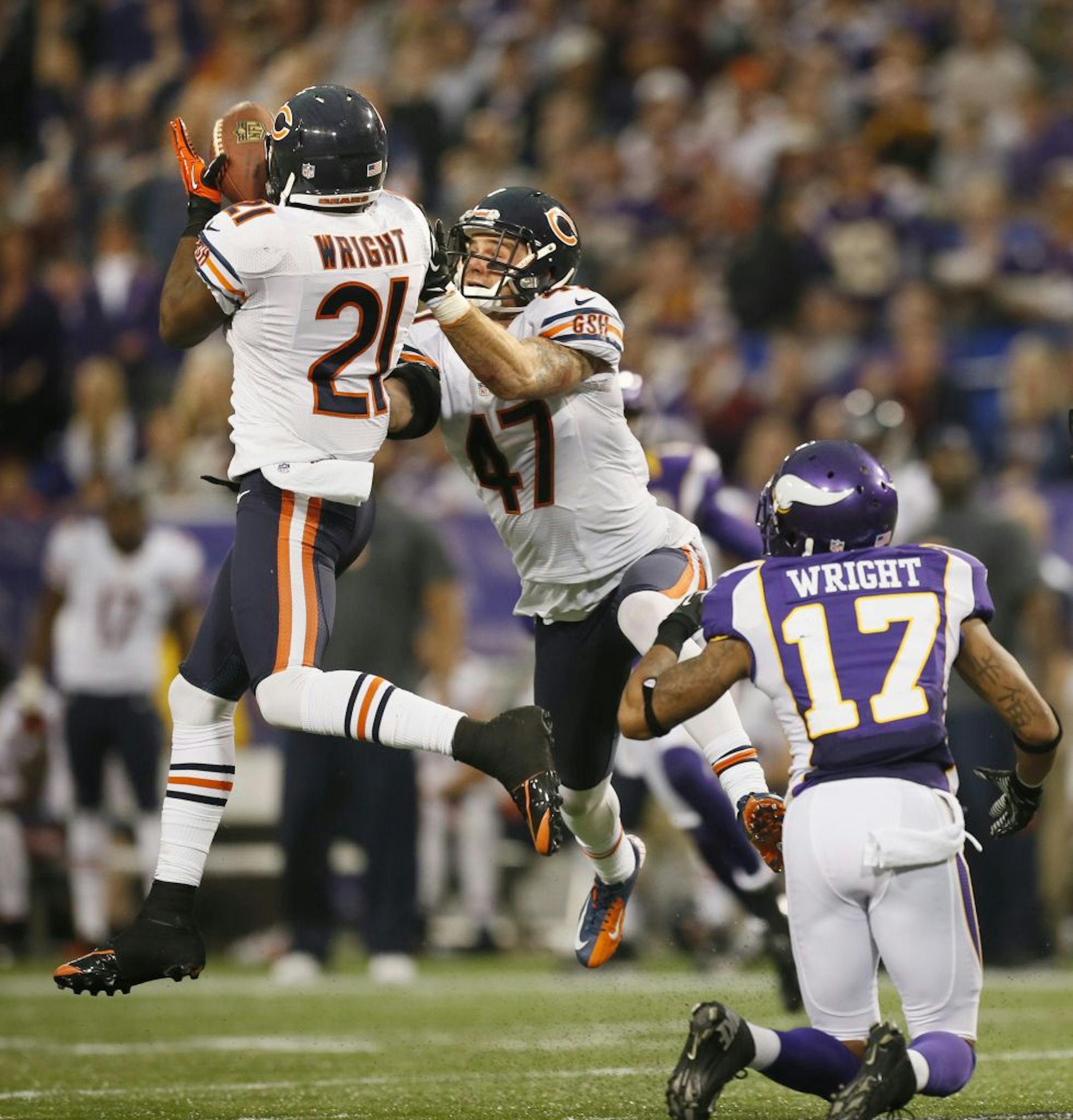 Bears defensive back Major Wright easily picked off an underthrown Christian Ponder pass intended for wide receiver Jarius Wright.