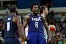 U.S. center DeAndre Jordan yells out after slamming down a rebounded miss shot over Spain's Pau Gasol, right, at a Men's Basketball Semifinal at Cario
