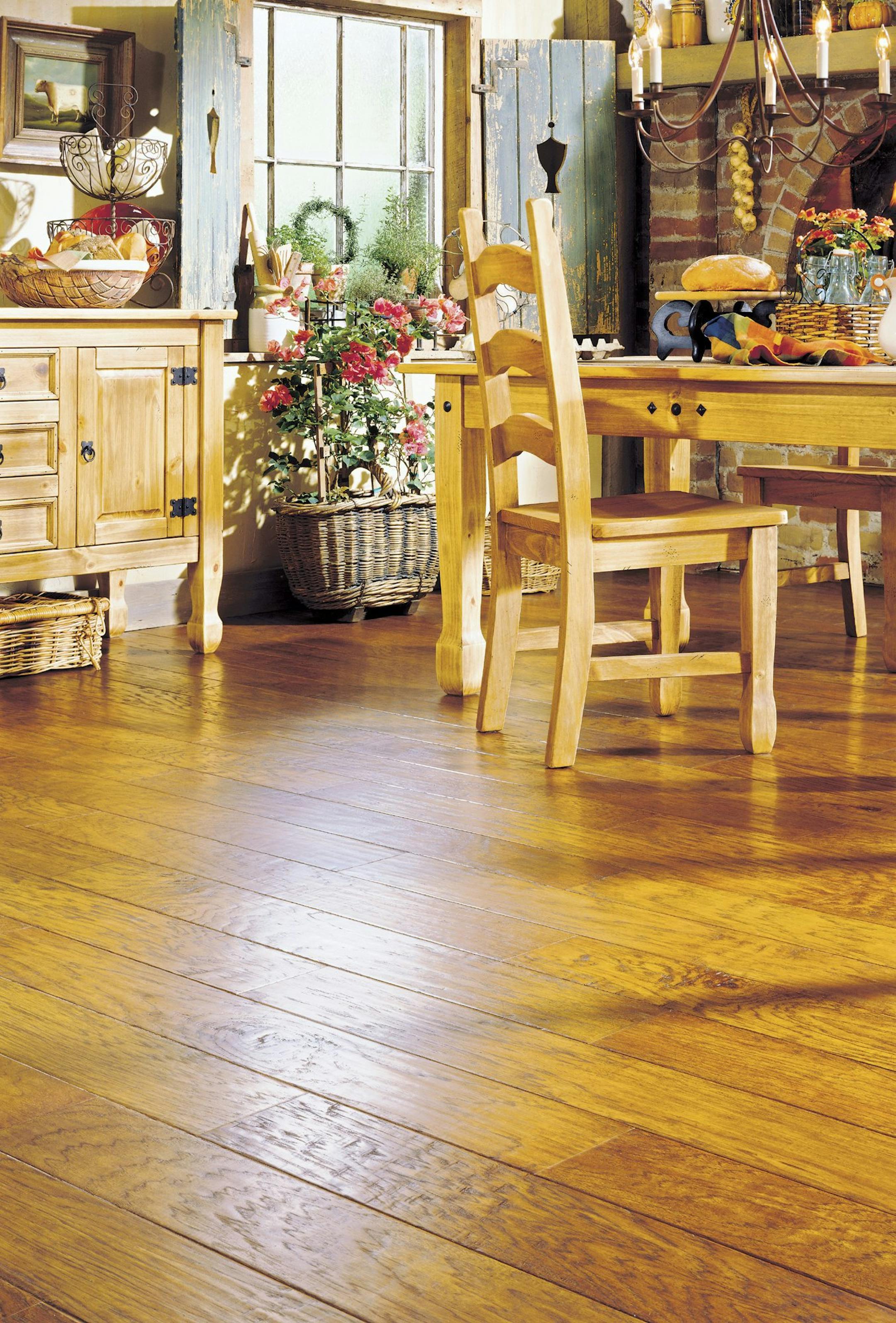 The latest hardwood styles are distressed, beveled, scratched with wormholes, and have a hand-hewn appearance, like this Biscotti style hardwood floor. (Courtesy Anderson Hardwood/Orange County Register/KRT) ORG XMIT: 1027094