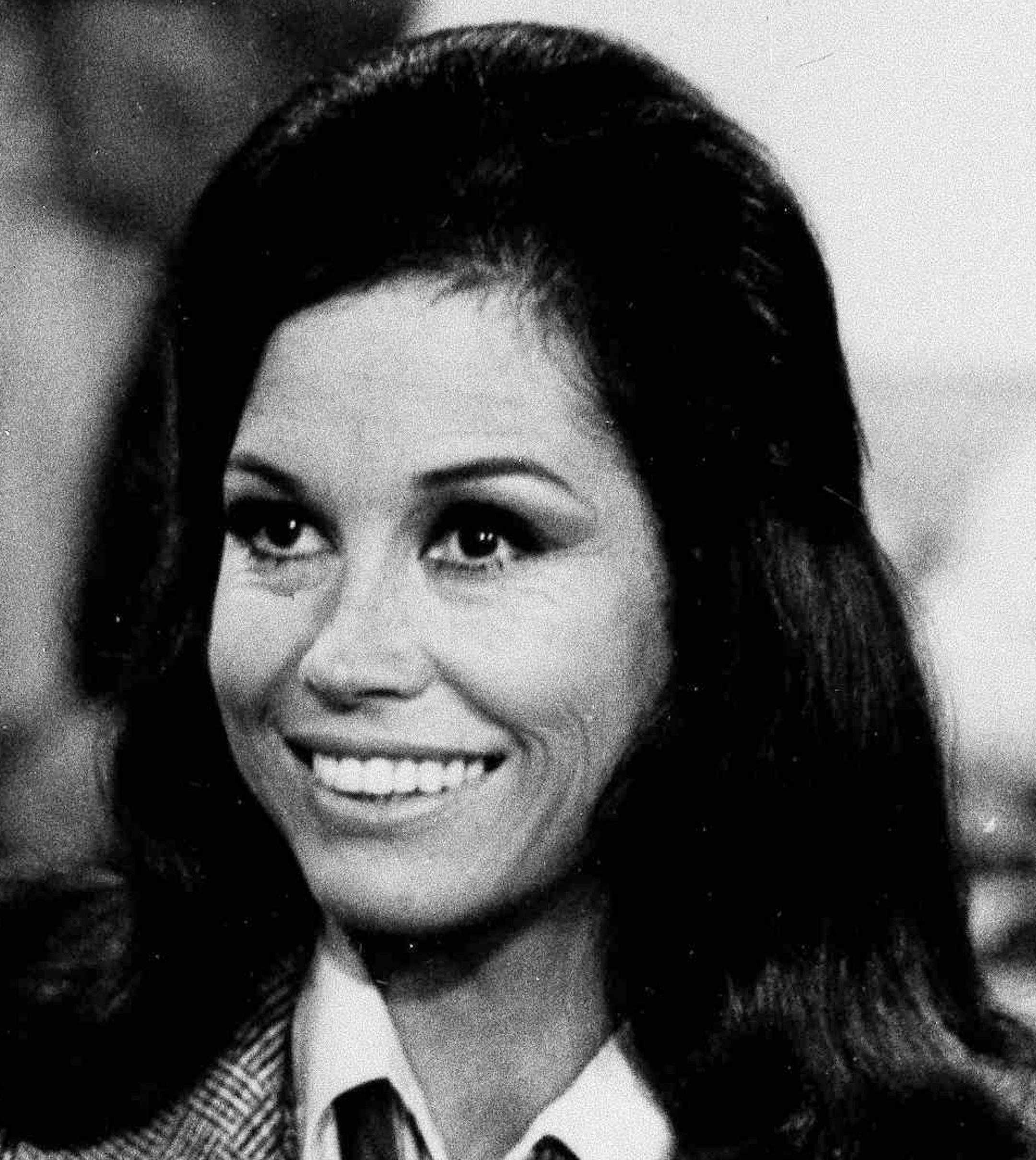 Actress Mary Tyler Moore is shown as TV news producer Mary Richards in a scene from the "The Mary Tyler Moore Show," Aug. 1970 (AP Photo) ORG XMIT: APHS326011