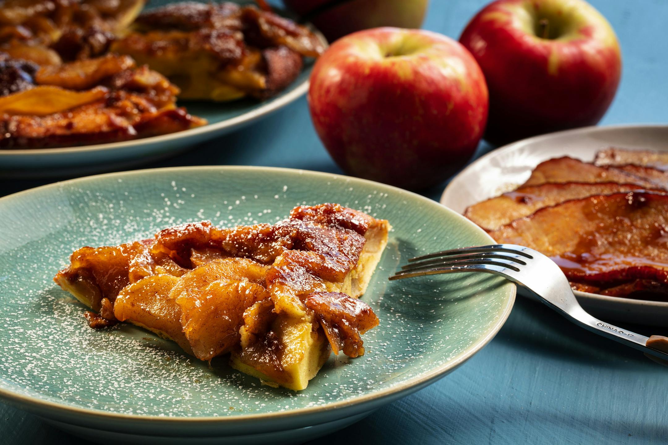 Curried glaze ham, right, accompanies the baked apple pancakes. (Zbigniew Bzdak/Chicago Tribune/TNS)