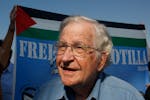 In this Oct. 20, 2012, file photo activist Noam Chomsky stands during a press conference to support the Gaza-bound flotilla in the port of Gaza City. 