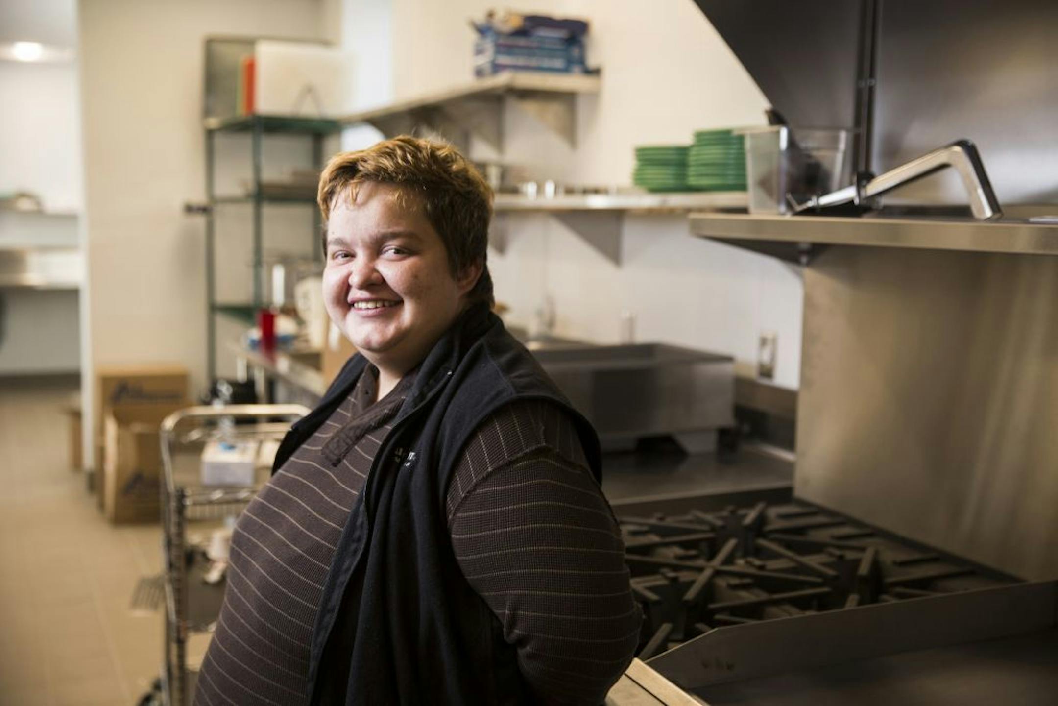 Desi Heaven, a member of Vail Place a clubhouse for those with mental illnesses, poses at the clubhouse in Hopkins on Wednesday, November 18, 2015. Heaven will be helping to cook Thanksgiving dinner at Vail Place.