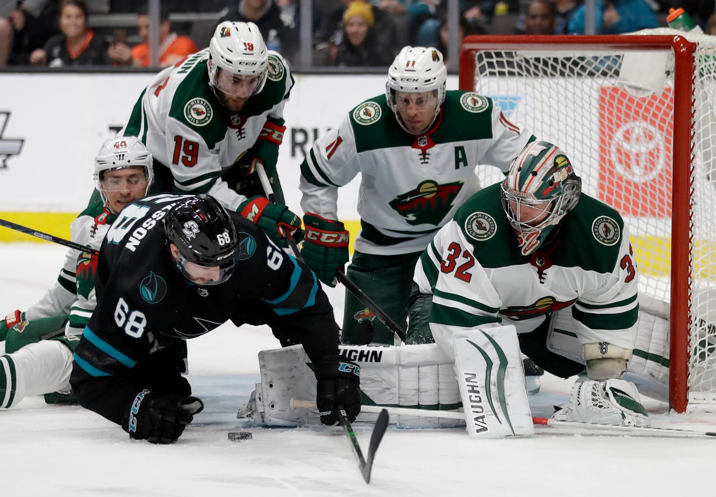 Wild goalie Alex Stalock blocks a shot from San Jose's Melker Karlsson in the third period