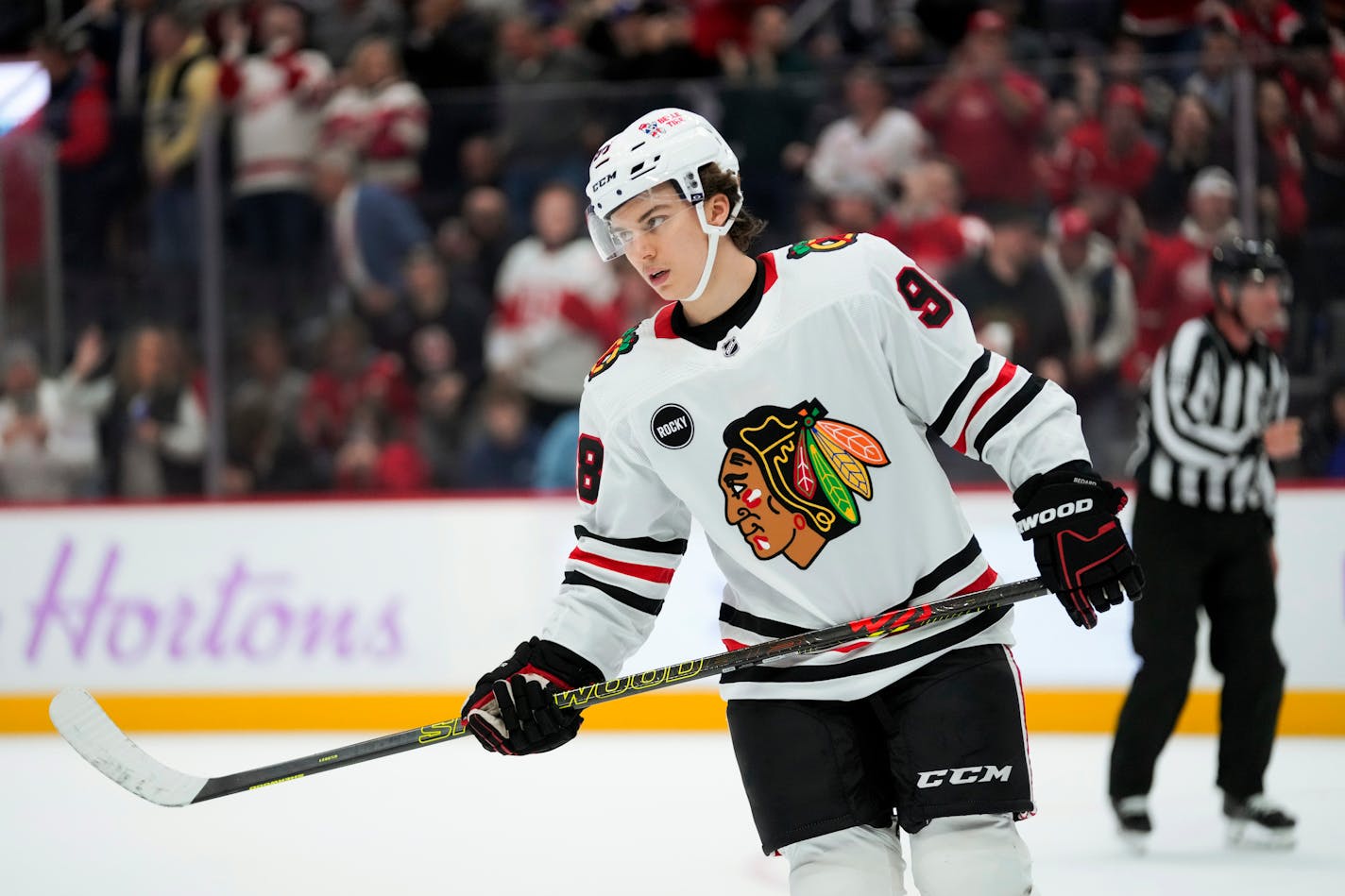 Chicago Blackhawks center Connor Bedard (98) plays against the Detroit Red Wings in the third period of an NHL hockey game Thursday, Nov. 30, 2023, in Detroit. (AP Photo/Paul Sancya)