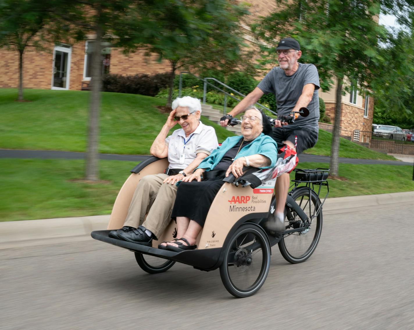 Tony Desnick of Cycling Without Age picked up Sister Susan Smith and Sister Rosalind Gefre for a ride from their home Carondelet Village, through St Catherine University, and around St. Paul. ] GLEN STUBBE &#x2022; glen.stubbe@startribune.com Friday, August 2, 2019 Across Minnesota, more nursing homes are starting a unique cycling program that aims to get seniors back on bikes even if they have limited mobility. The program, called Cycling Without Age, first started in Copenhagen and has spread