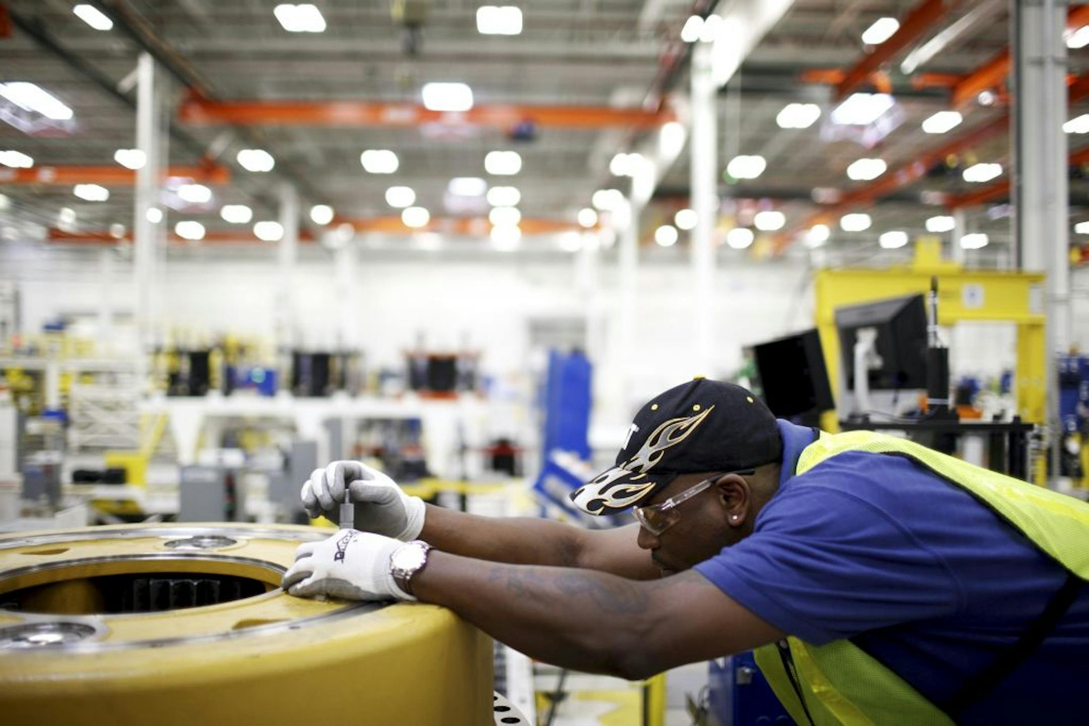 Leon Spencer got some on-the-job training at a Caterpillar Inc. factory in Winston-Salem, N.C.