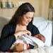 Emily McDonagh holds her newborn daughter, Clare, Thursday, March 24, 2022 at Maple Grove Hospital in Maple Grove, Minn. Clare was born March 23, 2022