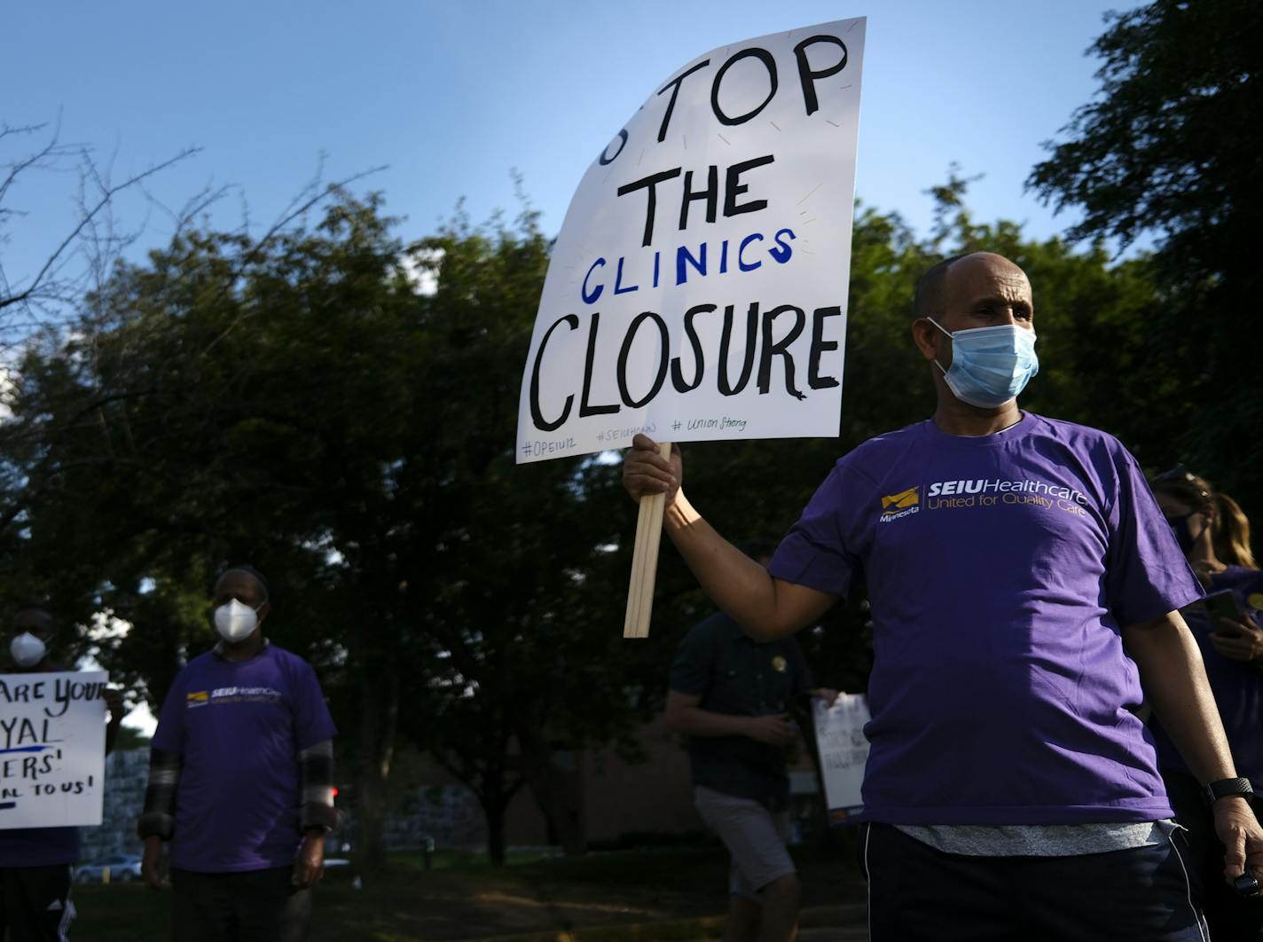 Abdi Mohamed, of the Cedar Riverside neighborhood, came out to support health care workers and call for the reopening of the Riverside Clinic.