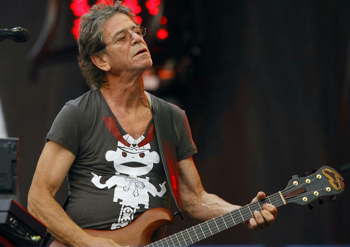 FILE - In this Sunday, Aug. 9, 2009 file photo, Lou Reed performs at the Lollapalooza music festival, in Chicago. Punk-poet, rock legend Lou Reed is dead of a liver-related ailment, his literary agen said Sunday, Oct. 27, 2013. He was 71.