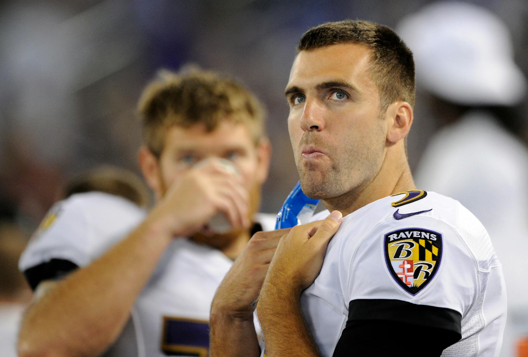 Baltimore Ravens quarterback Joe Flacco looks on from the sideline in the second half of an NFL preseason football game against the San Francisco 49ers, Thursday, Aug. 7, 2014, in Baltimore. (AP Photo/Nick Wass)