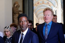 Chris Rock, left, and Conan O'Brien arrive for an audience with Pope Francis in the Clementine Hall at The Vatican, Friday, June 14, 2024. Pope Franci