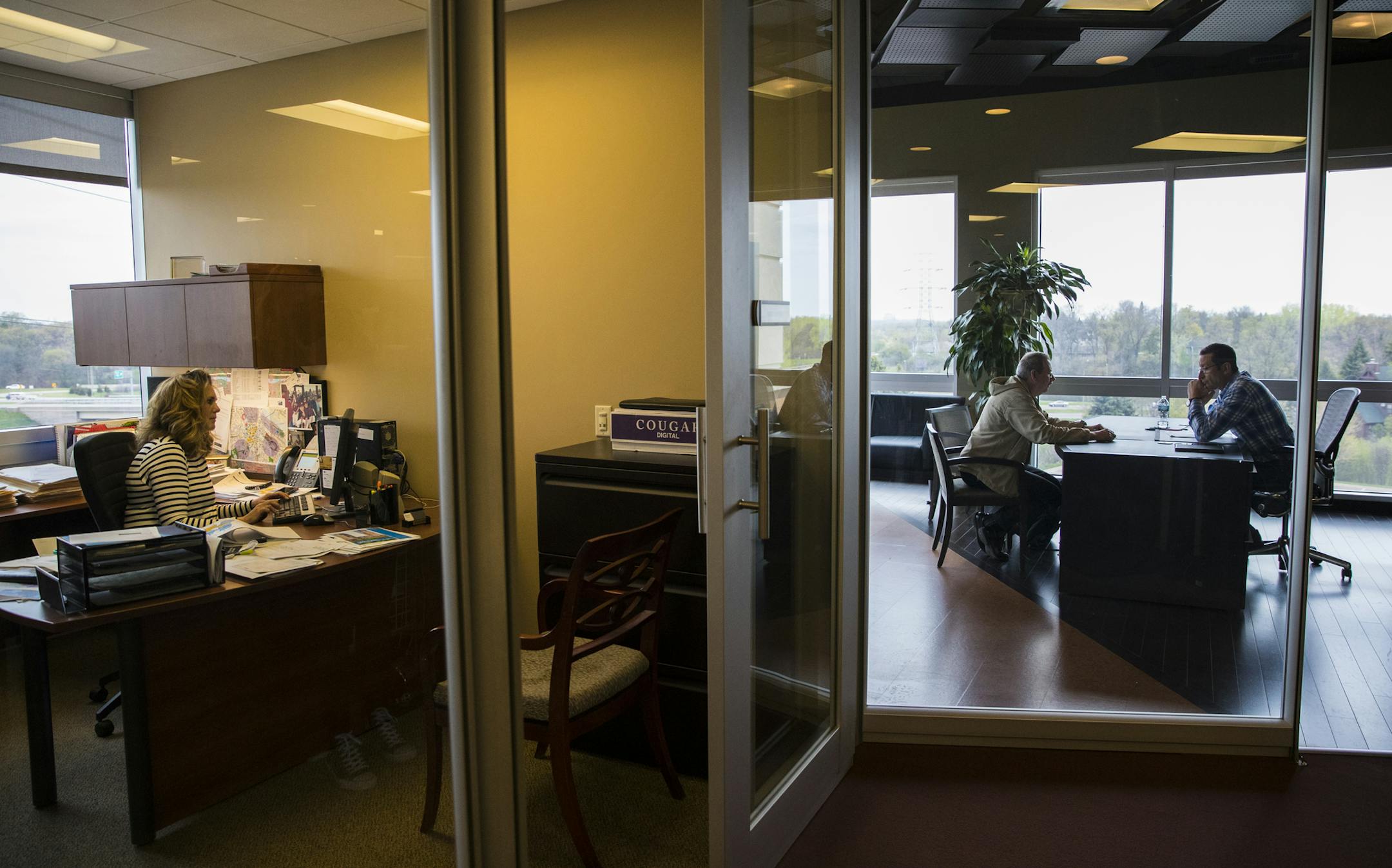 Employees worked in their offices at Colliers International (formerly Welsh) in Hopkins, Minn., on Tuesday, April 25, 2017. ] RENEE JONES SCHNEIDER • renee.jones@startribune.com