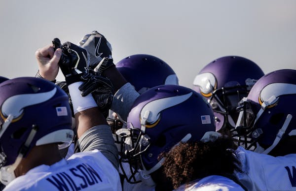 Minnesota Vikings linebackers huddled up during a practice at the London Irish Training Ground in perpetration for a game vs. the Cleveland Browns.
