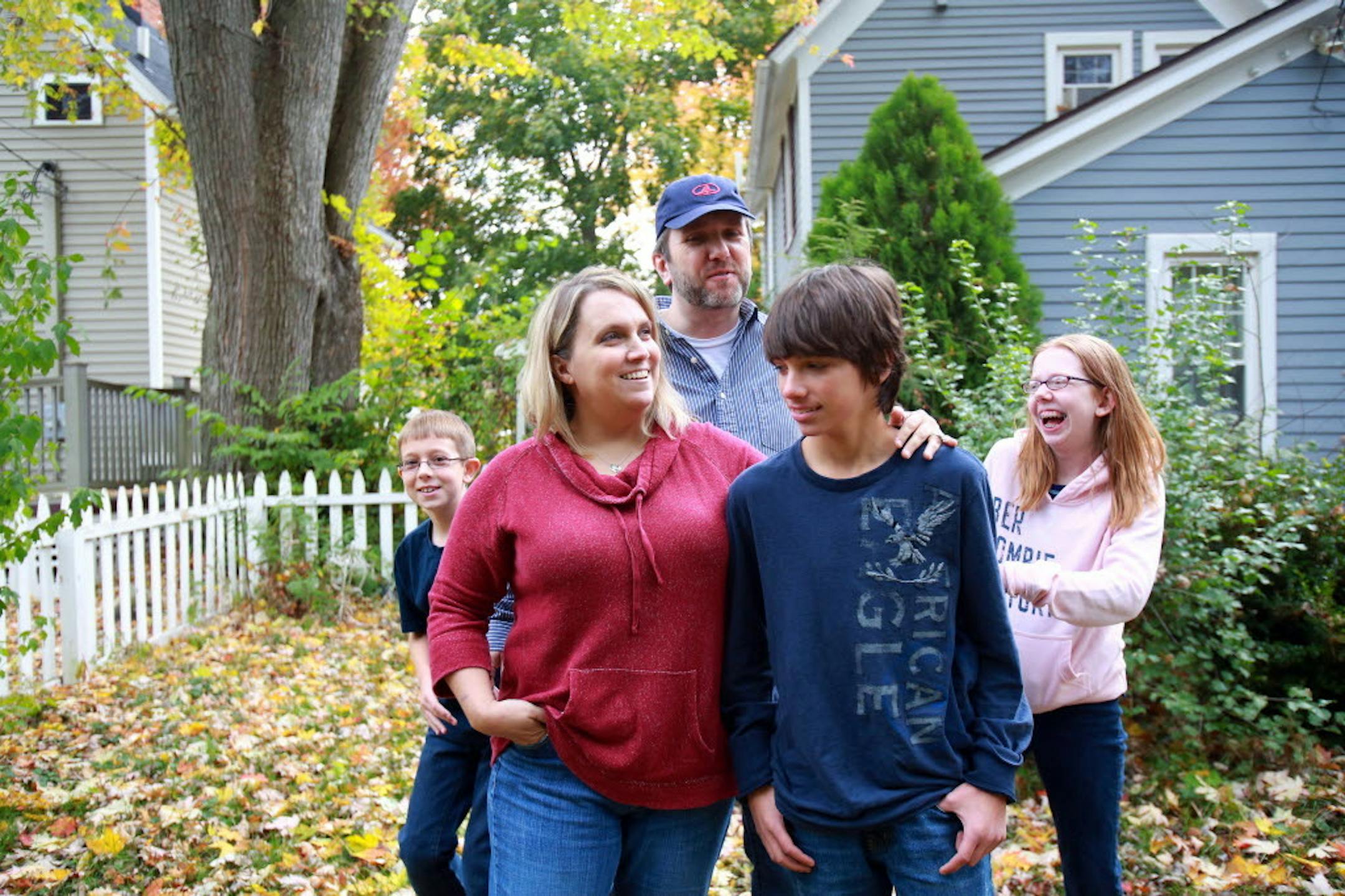 The Burns family, from left: Alec, Kristi, Mike, Griffin, and Brianna, outside their home in Chelsea, Mich. Oct. 26, 2013. Kristi and Mike, on their third marriage each, and their children who spend time with other parents, are an example of how Americans are rapidly redefining the notion of the "typical family."