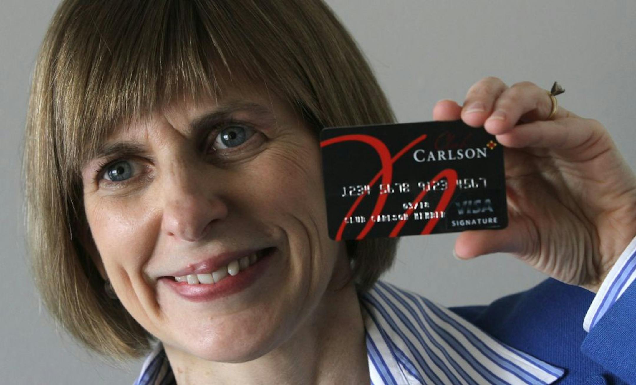 Suzy Riesterer, Carlson Rezidor's Hotel Group chief commercial officer, held the new credit card issued by the Carlson Rezidor Hotel Group, which includes the Radisson chain and Country Inns & Suites. The card is a new branded credit card with US Bank to enhance its Club Carlson loyalty program. Photographed on 11/29/12 at the Carlson Headquarters in Minnetonka MN.