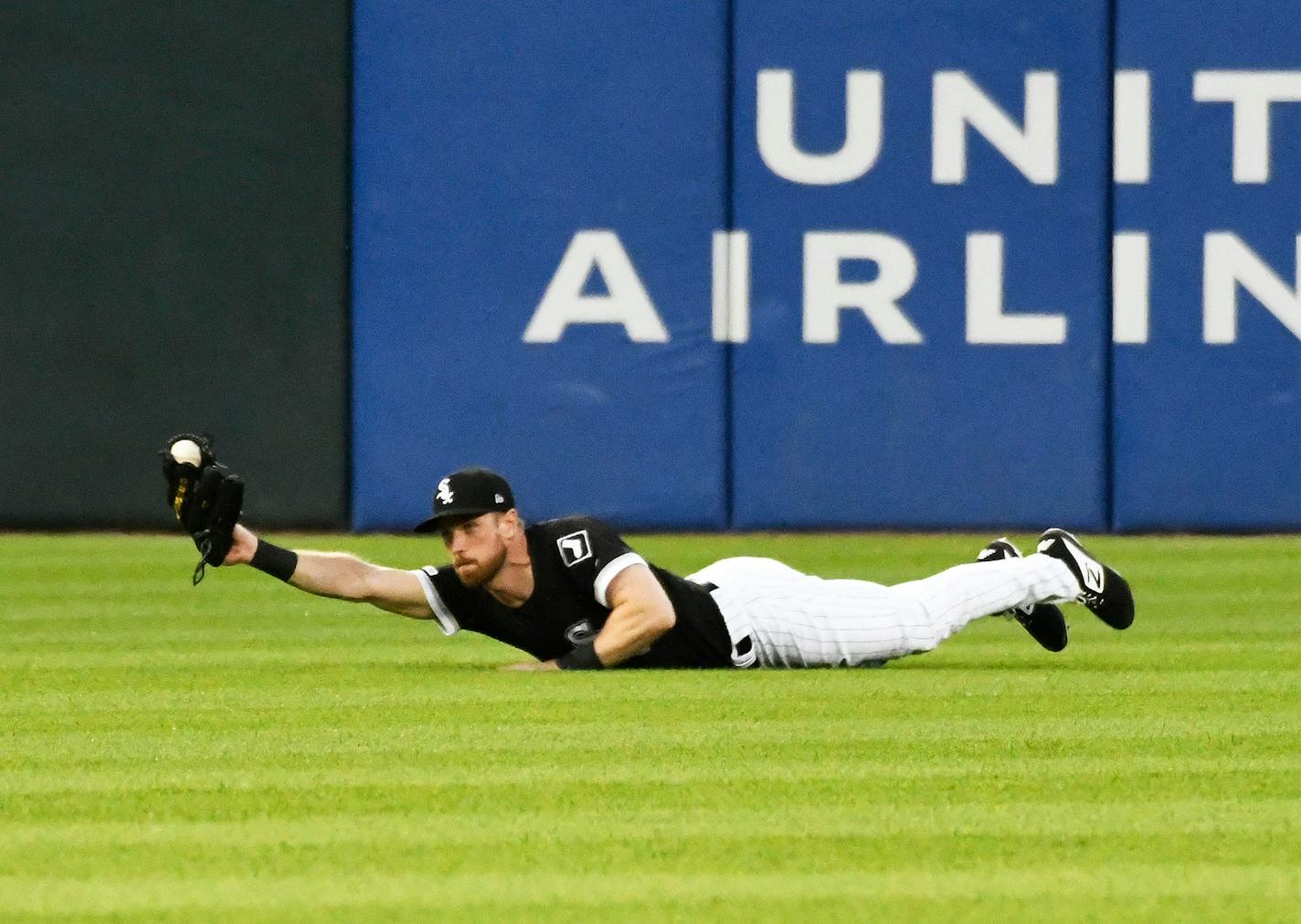 Charlie Tilson of the White Sox makes a catch on LaMonte Wade Jr. during the fifth inning at Guaranteed Rate Field in Chicago