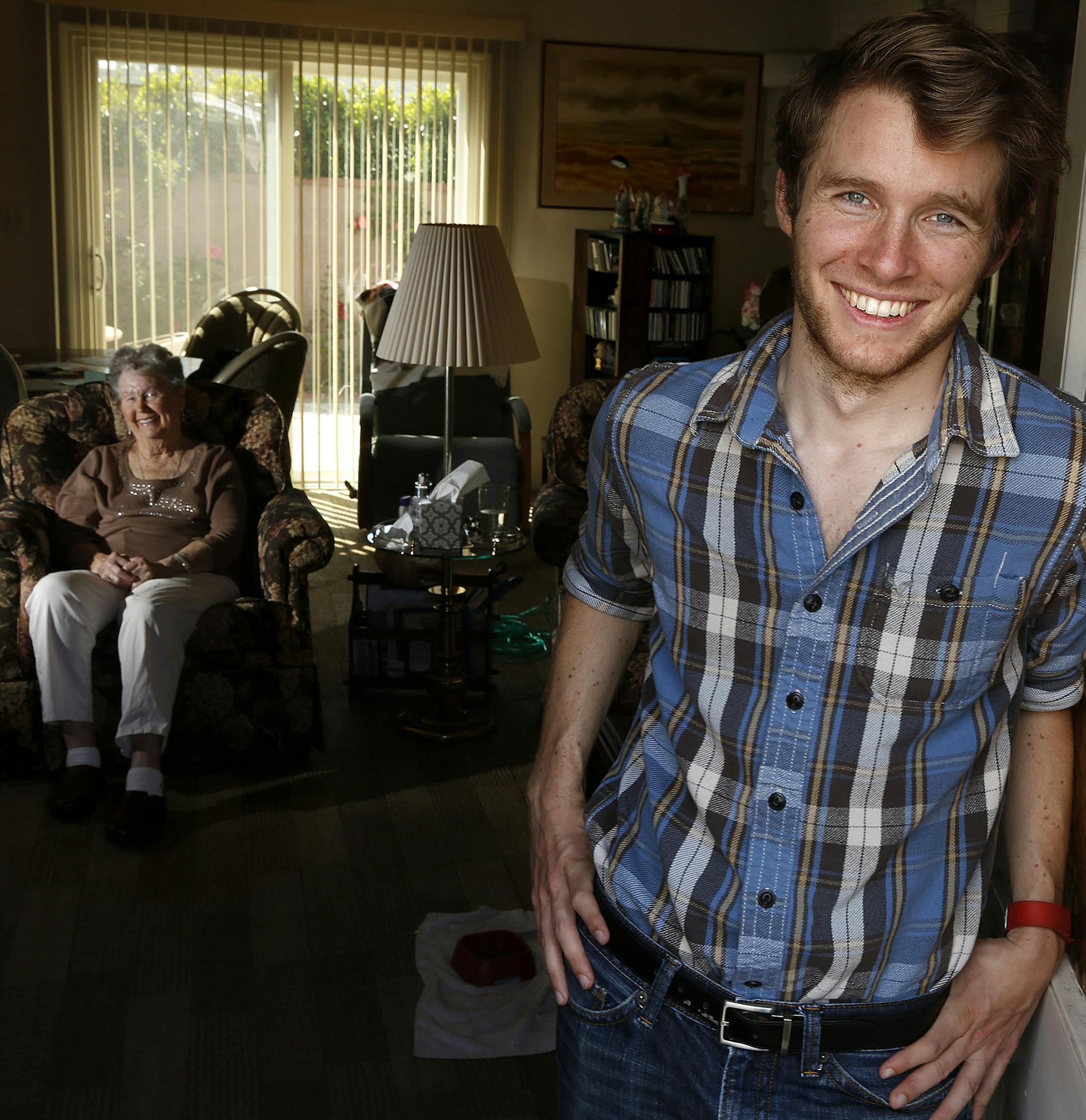 Justin Boogaard, 24, right, started Go Go Grandparent, a service helps those without smartphones to be able to use Uber ride service, with his grandmother Betty Luce, 85, left, in mind. ( Rick Loomis/Los Angeles Times/TNS)
