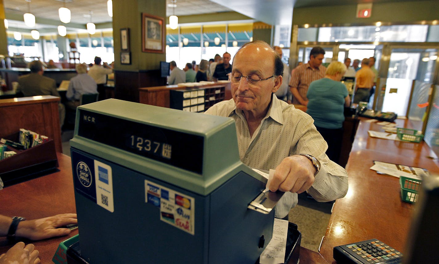 Peter&#x2019;s Grill owner Peter Atsidakos worked the dated cash register and greeted customers Friday The 99-year-old restaurant is closing on Saturday.