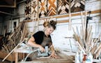Anna Bailey at work in her wood shop.