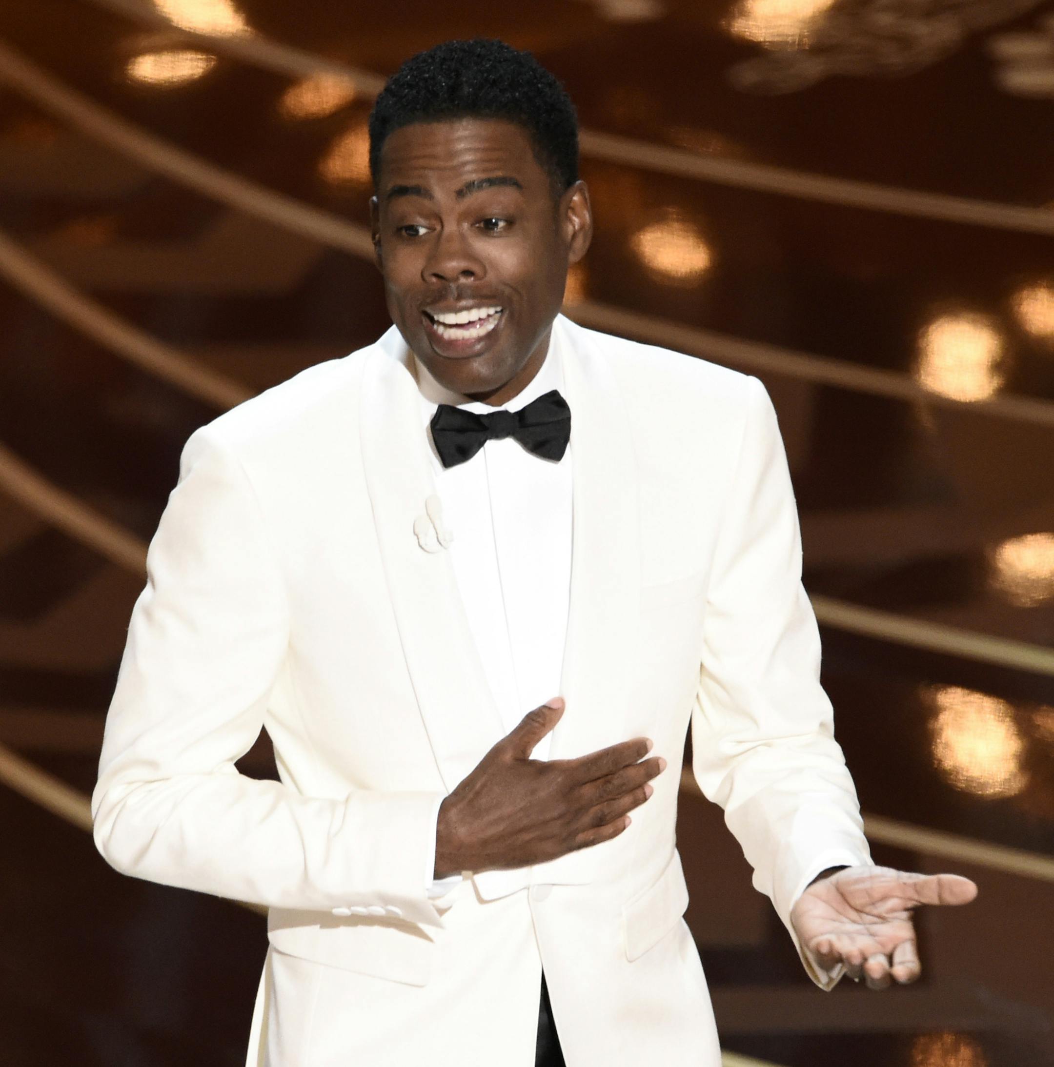 Host Chris Rock speaks at the Oscars on Sunday, Feb. 28, 2016, at the Dolby Theatre in Los Angeles. (Photo by Chris Pizzello/Invision/AP)
