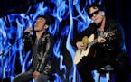 Arnel Pineda, left, has been singing with Neal Schon and Journey since 2007.